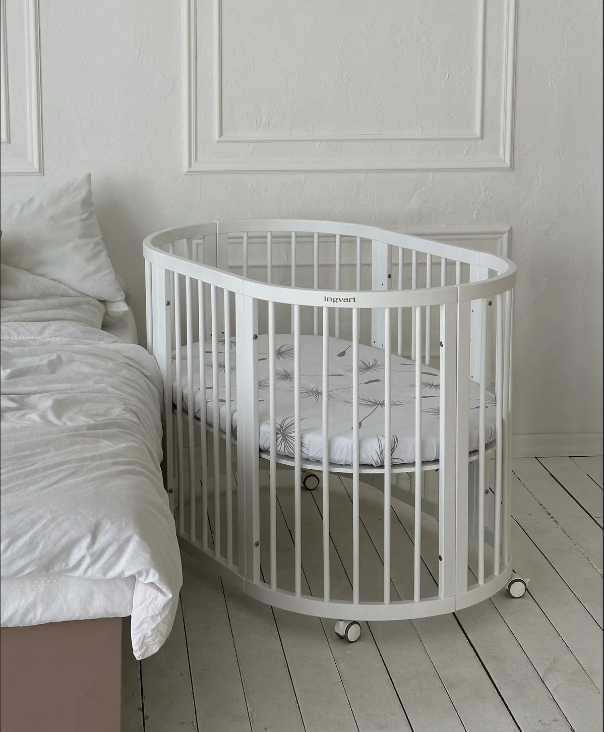 Ovāla bērnu gultiņa Transformers Smart Bed 7 in 1 82/75/60 cm ivory krāsa - N1 Home