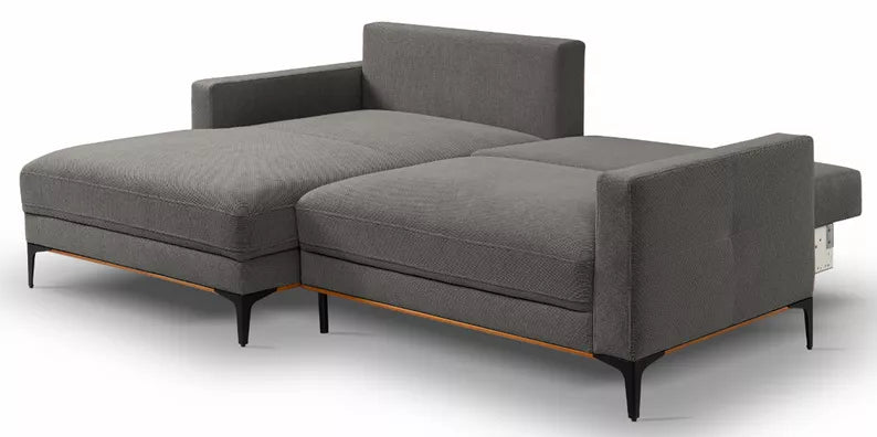 DASSINO L-formas stūra dīvāns ar gulēšanas funkciju ar glabātuvi, tumši pelēks hidrofobs šenils, kreisa/laba puse - N1 Home