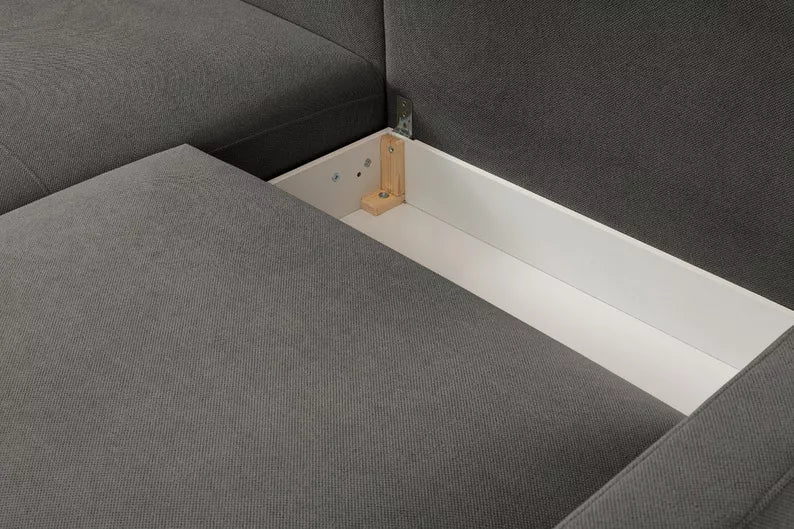 DASSINO L-formas stūra dīvāns ar gulēšanas funkciju ar glabātuvi, tumši pelēks hidrofobs šenils, kreisa/laba puse - N1 Home