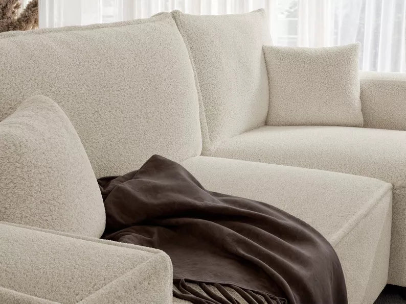 CARLO L-veida stūra dīvāns ar gulēšanas funkciju, ar konteineri, universāls, krēmkrāsas bukle - N1 Home