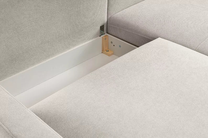 DASSINO L-formas stūra dīvāns ar gulēšanas funkciju ar glabātuvi, balts hidrofobs šenils, kreisa/laba puse - N1 Home